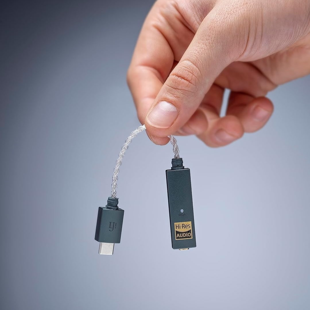 iFi GO link Dongle DAC hanging between fingers