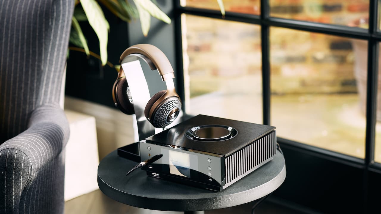 Naim Uniti Atom HE with Focal Clear MG Headphones Lifestyle